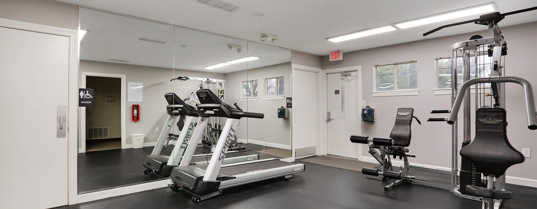 fitness center with large mirrors